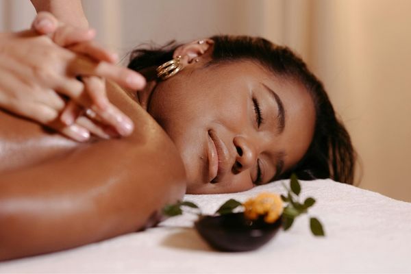 Body glistening with special massage gel.