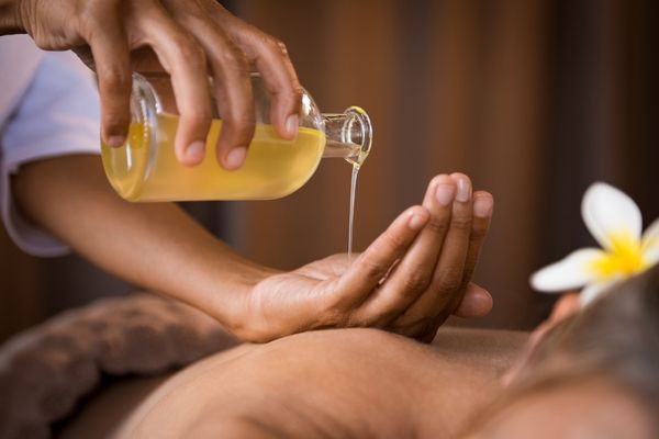 Classic oil massage with warm stones.